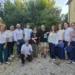 Gabriele Geminiani è al centro con Lucia Ferrati con i lettori de Le Voci dei Libri ai lati