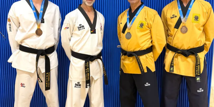 Da sinistra: Orsini Lorenzo 3° classificato cat. senior cintura nera -80kg - combattimento, Maestro Betti Roberto, Maurizio Sanchi 2° classificato cat. Master3 - poomsae e Marcello Bernardi 3° classificato cat. Master3 - poomsae